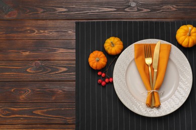 Photo of Autumn table setting and pumpkins, flat lay. Space for text