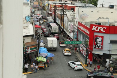 Photo of San Pedro Garza García, Mexico – September 15, 2022: Beautiful cityscape with people and cars on street