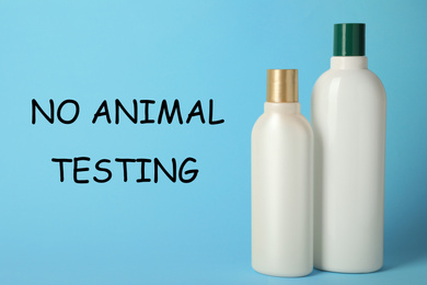 Image of Bottles of cosmetic products and text NO ANIMAL TESTING on light blue background
