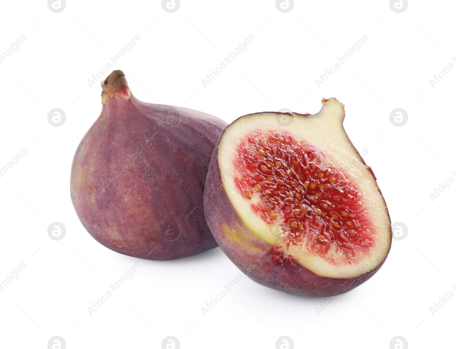 Photo of Whole and cut tasty fresh figs isolated on white