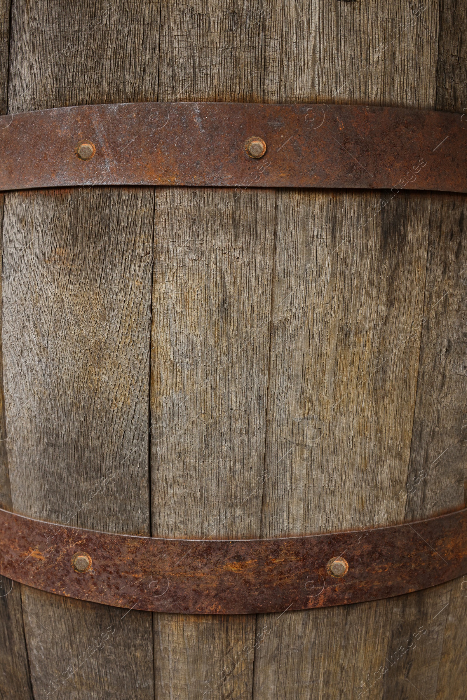 Photo of Traditional wooden barrel as background, closeup. Wine making