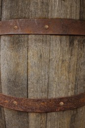 Photo of Traditional wooden barrel as background, closeup. Wine making