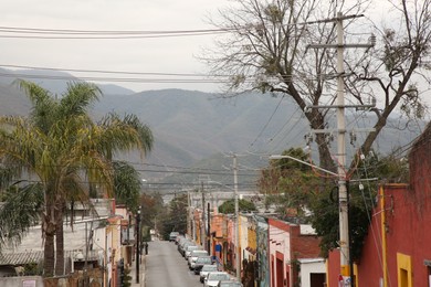 San Pedro Garza Garcia, Mexico – February 8, 2023: View on street with cars and beautiful buildings