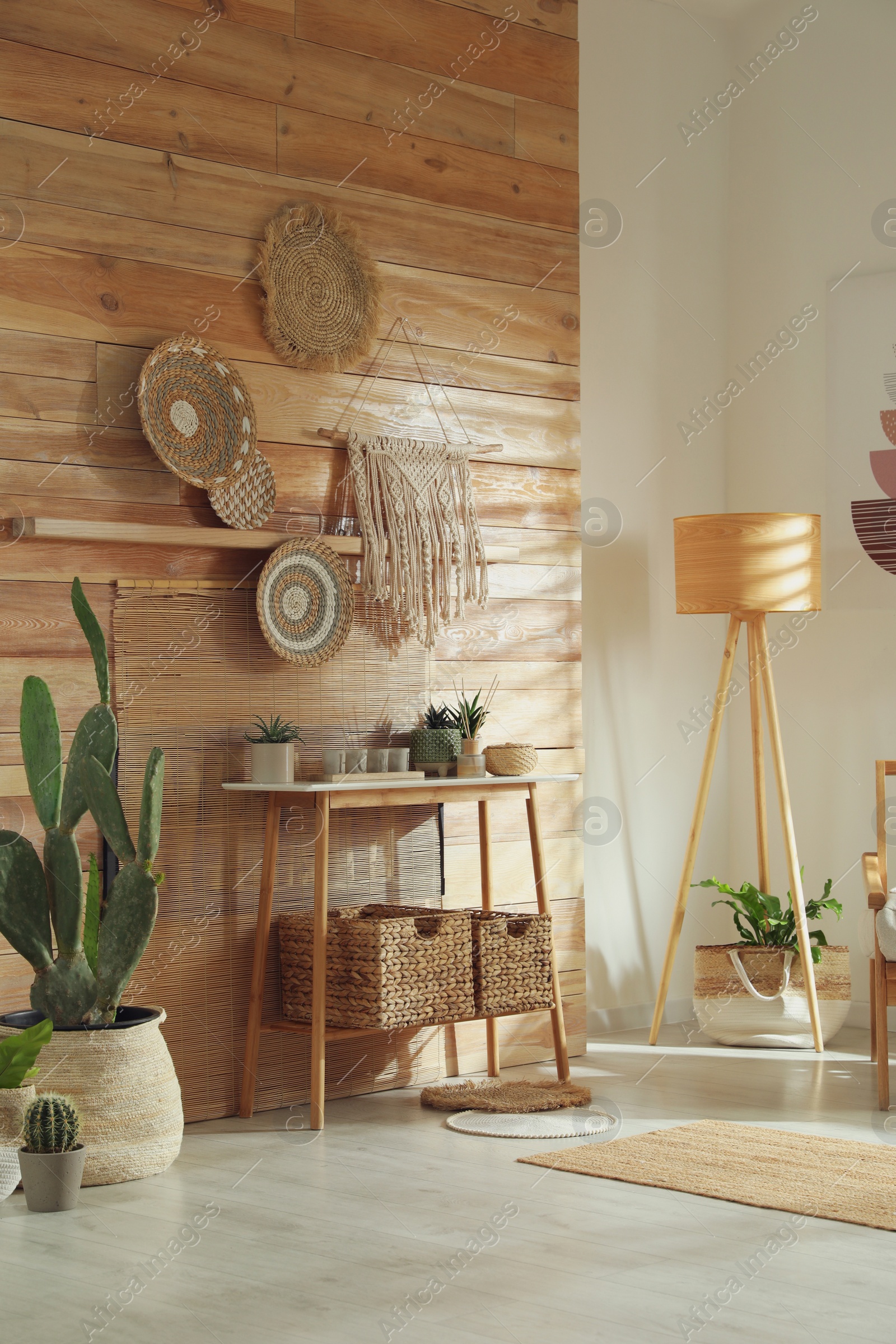 Photo of Stylish living room interior with wooden furniture and beautiful houseplants