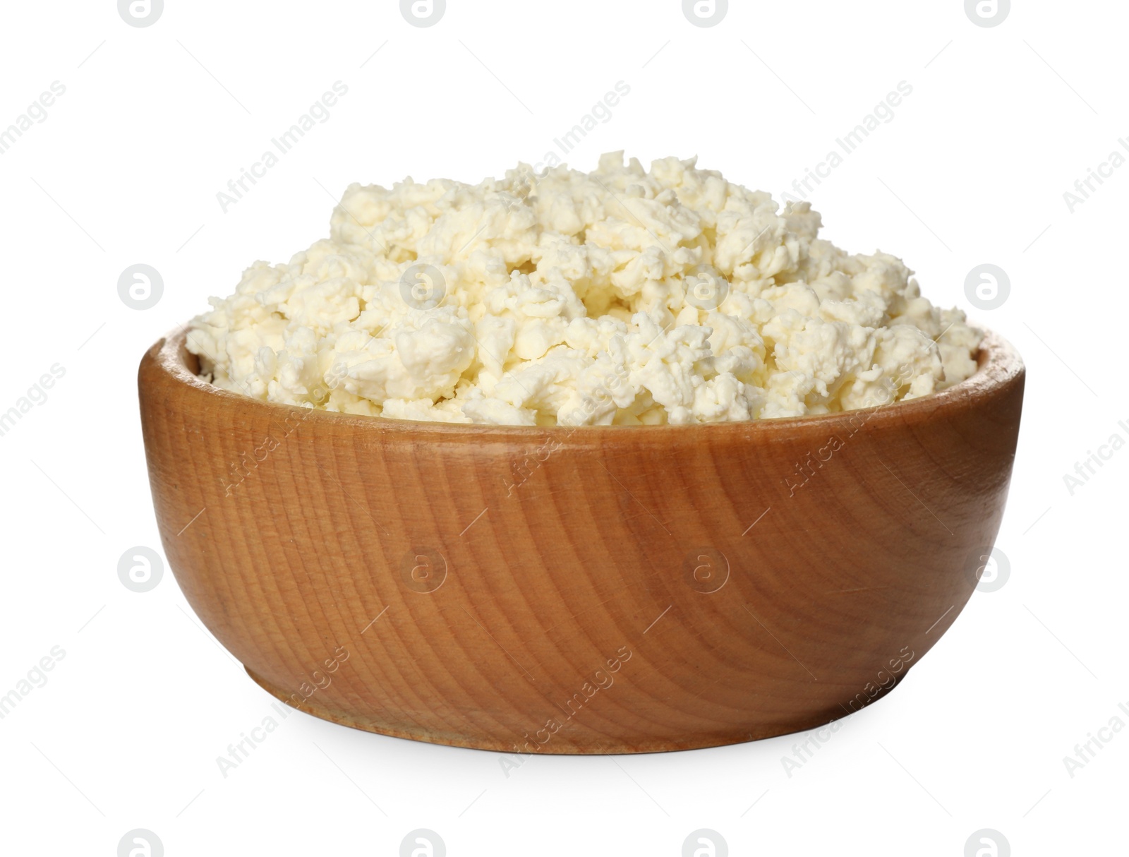 Photo of Delicious fresh cottage cheese in bowl isolated on white