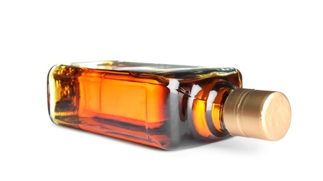 Bottle of scotch whiskey on white background