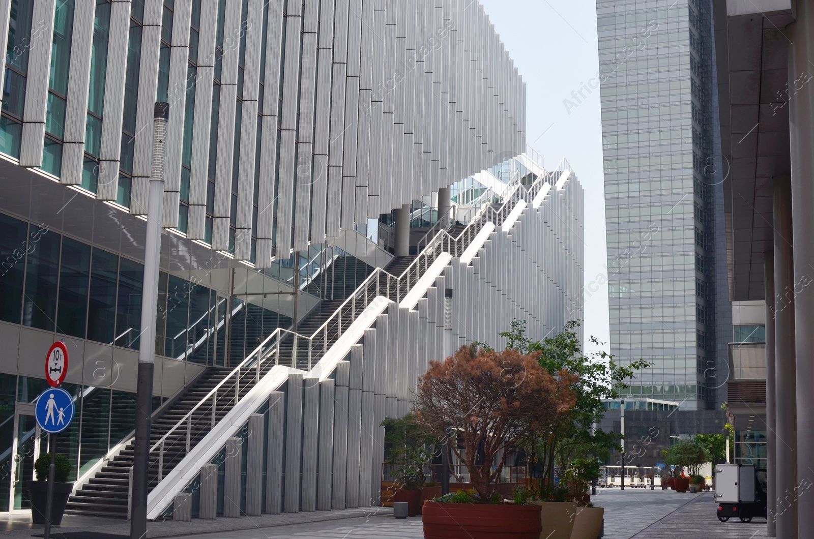 Photo of City street with beautiful modern urban architecture