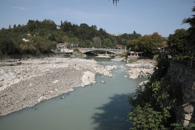 Photo of Kutaisi, Georgia - September 2, 2022: Picturesque view of city and Rioni river