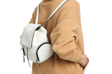 Photo of Young woman in casual outfit with stylish bag on white background, closeup