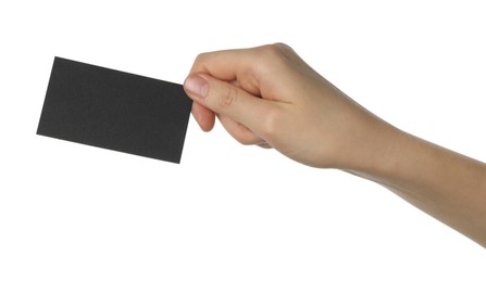 Woman with blank black business card on white background, closeup. Mockup for design