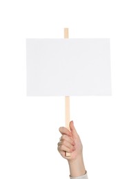 Photo of Woman holding blank protest sign on white background, closeup