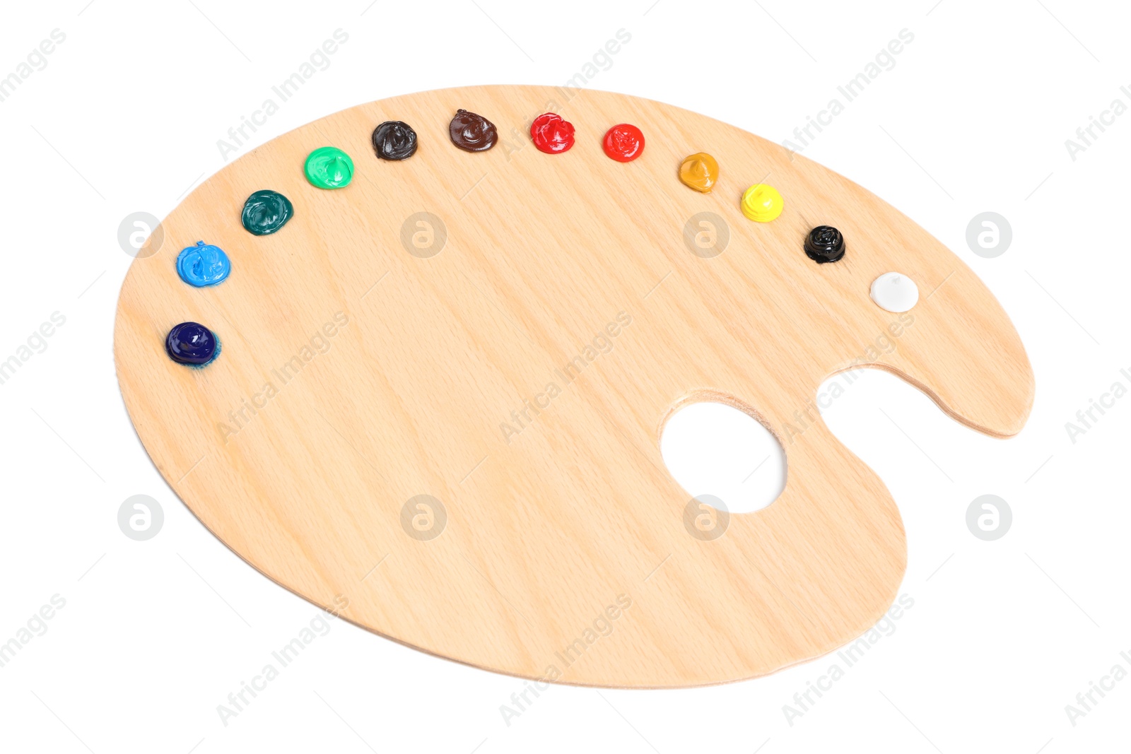 Photo of Palette with paints on white background, top view. Artist equipment