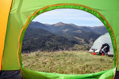 Photo of Picturesque mountain landscape, view from camping tent