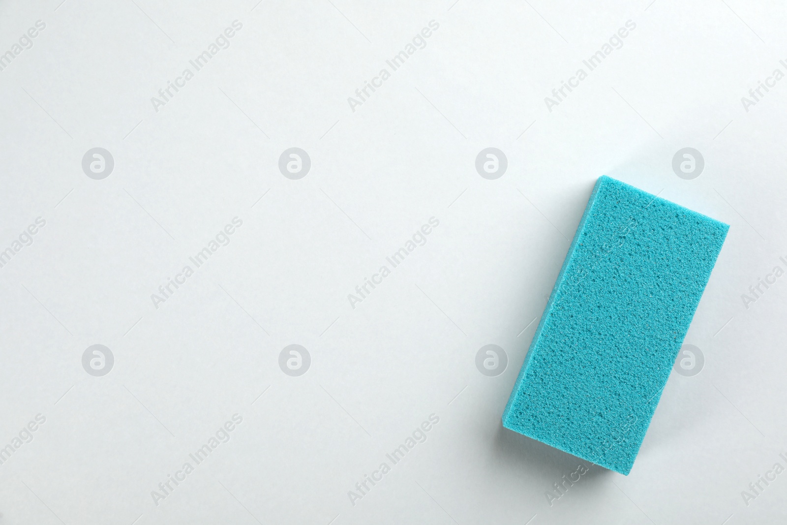 Photo of Pumice stone on light grey background, top view. Space for text