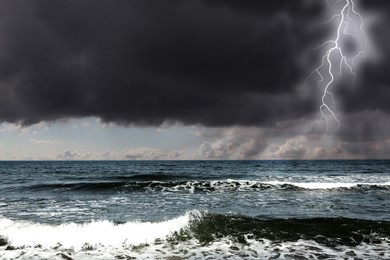 Image of Sea weather. Thunder cloud and lightning over water