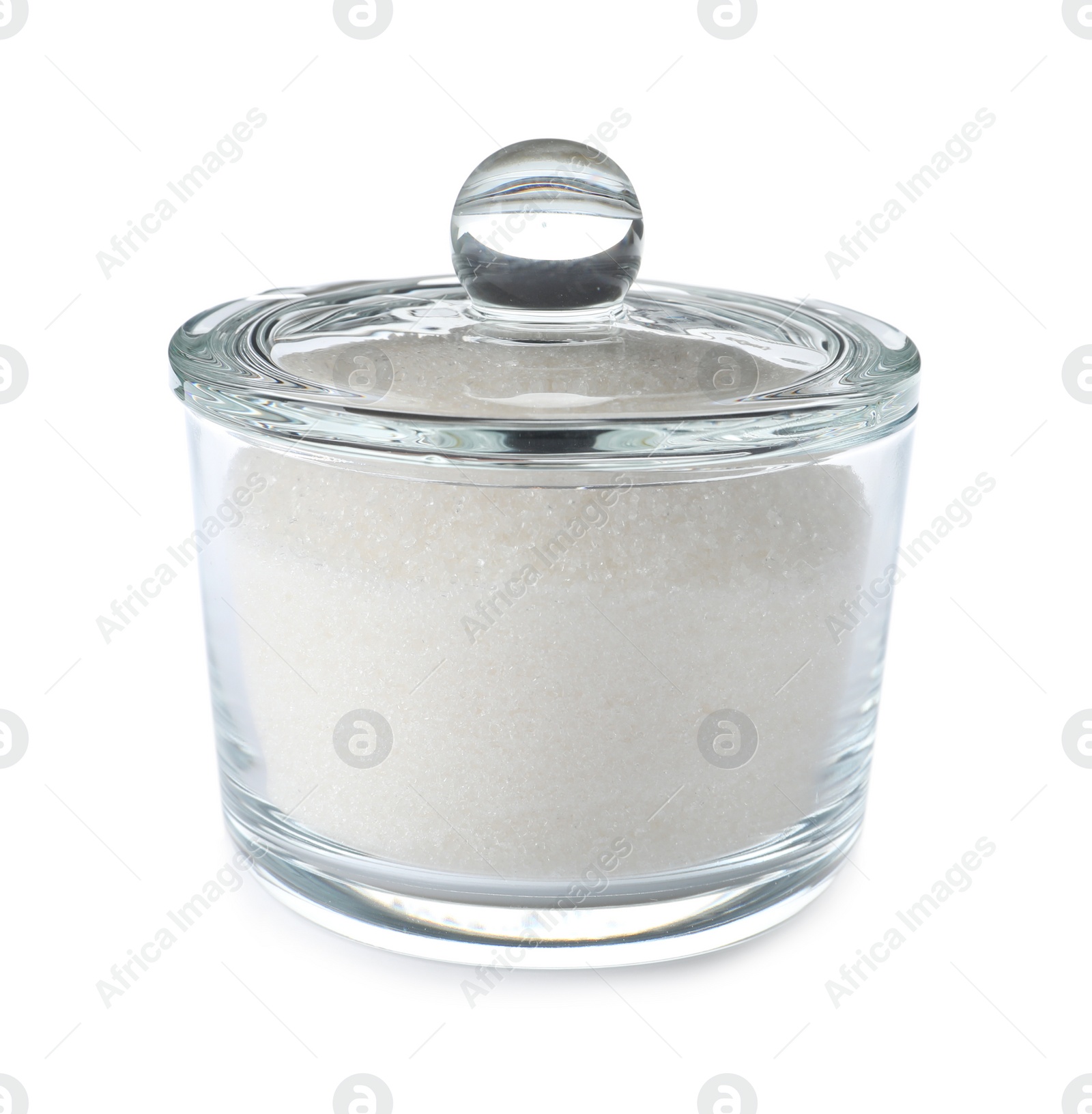 Photo of Glass bowl with sugar isolated on white