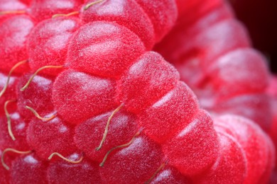 Photo of Texture of fresh ripe raspberry, macro view