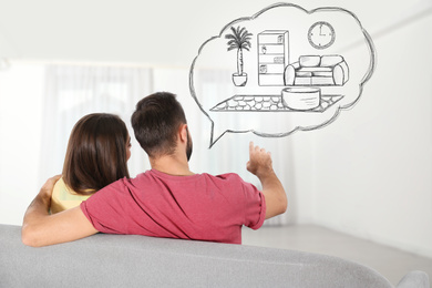 Image of Moving to new house. Couple imagining living room arrangement. Illustrated interior design in speech bubble