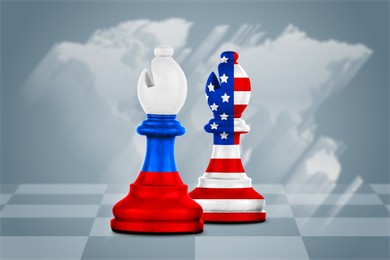 Image of Chess pieces in color of Russian and American flags on board