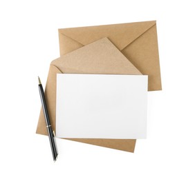 Photo of Brown envelopes, blank letter and pen isolated on white, top view