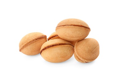 Photo of Delicious nut shaped cookies with boiled condensed milk on white background