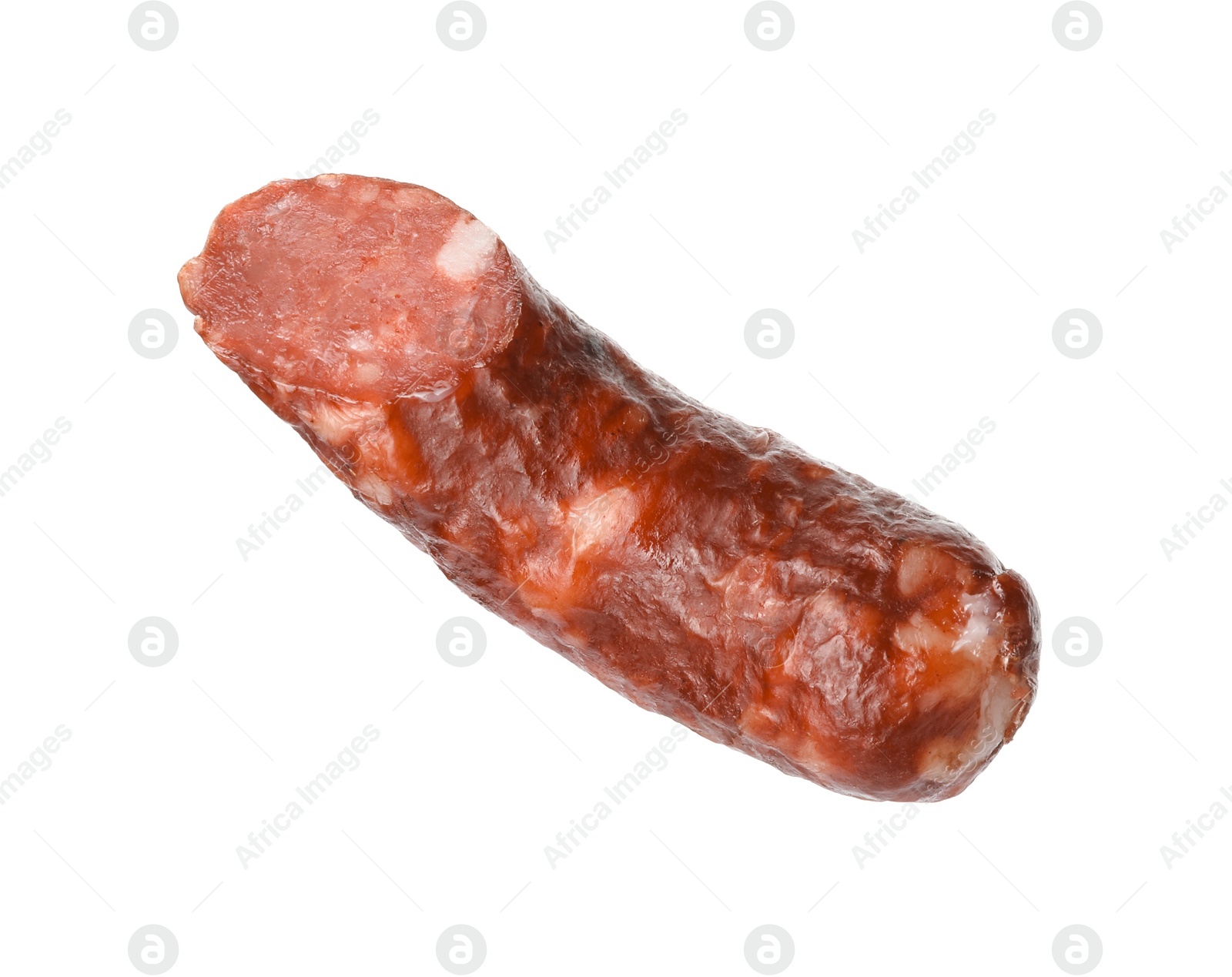 Photo of Piece of thin dry smoked sausage isolated on white