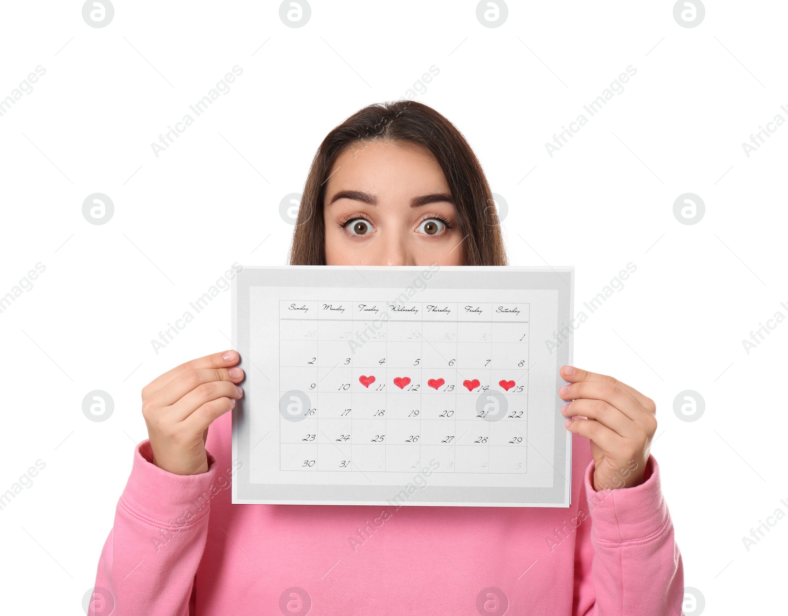 Photo of Young woman holding calendar with marked menstrual cycle days isolated on white