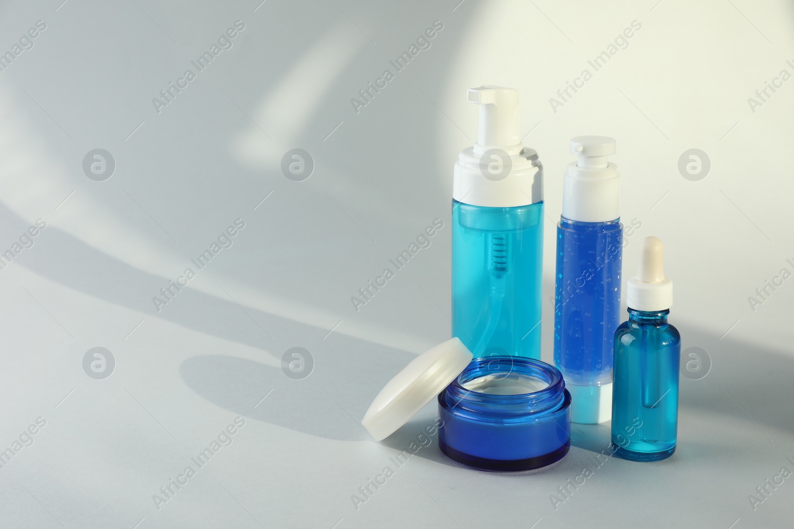 Photo of Set of luxury cosmetic products on white background. Space for text