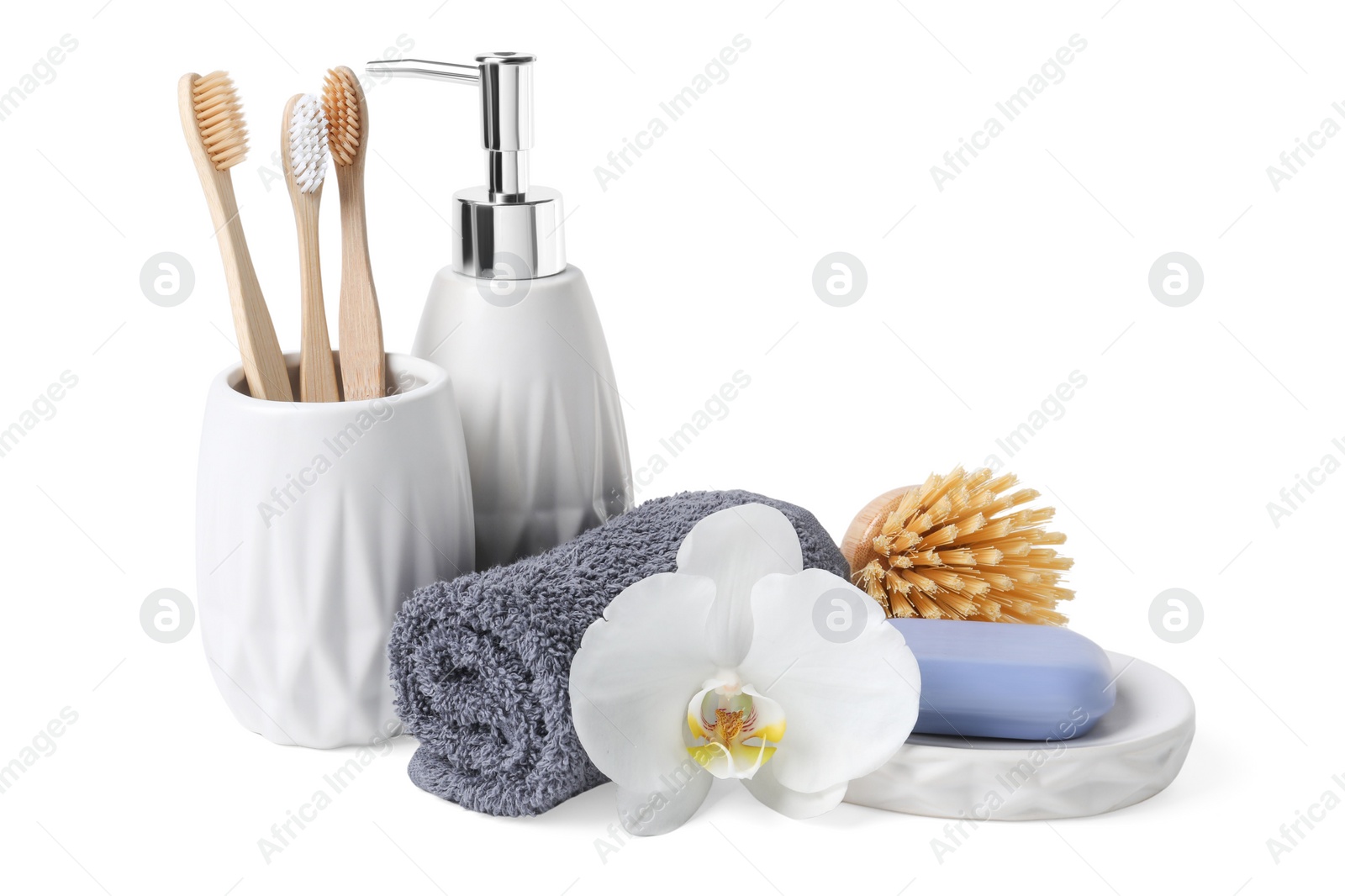 Photo of Bath accessories. Set of different personal care products and flower isolated on white