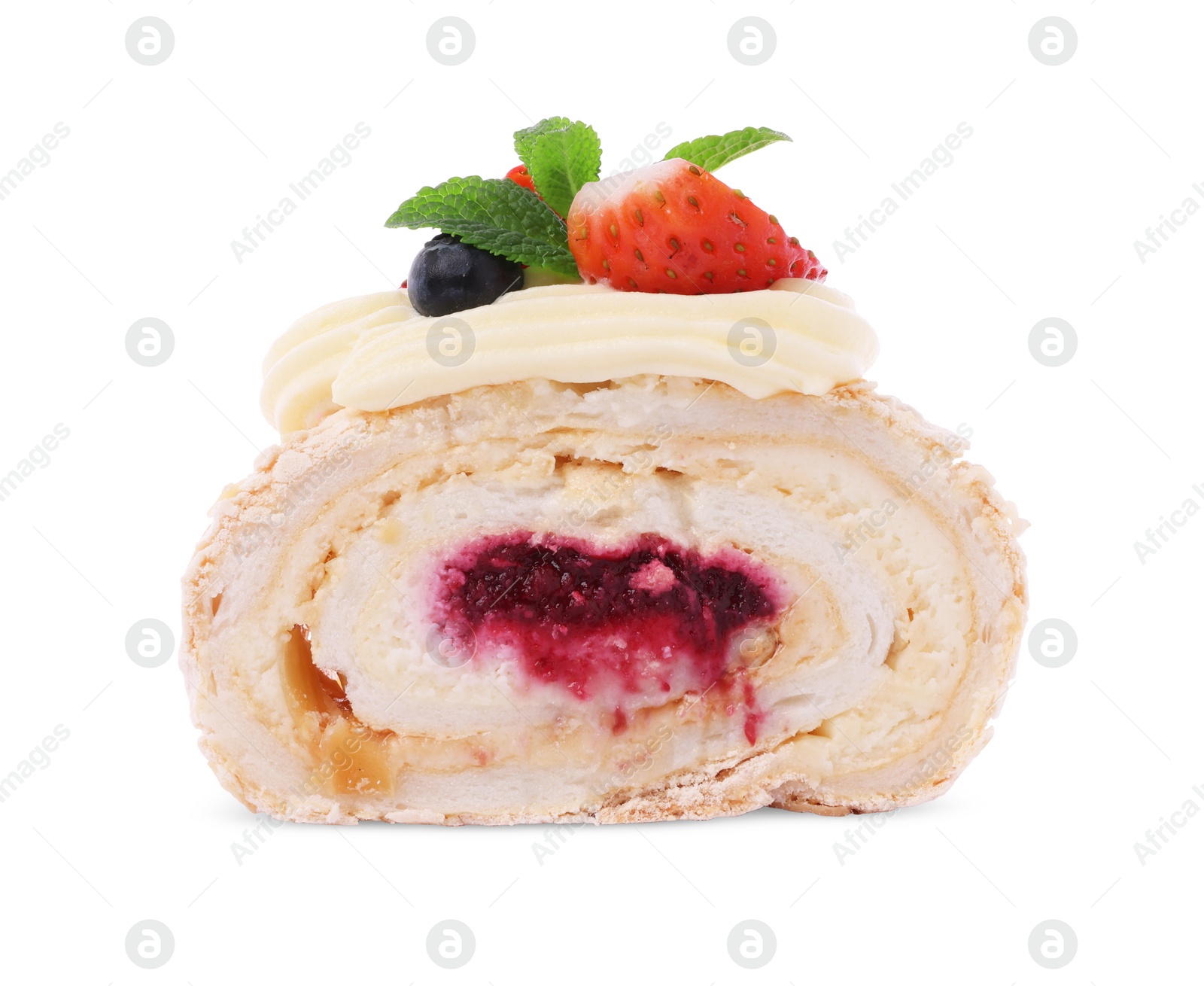 Photo of Slice of tasty meringue roll with jam, berries and mint leaves isolated on white