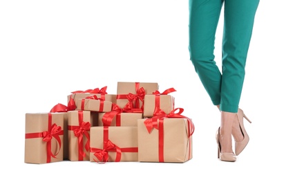 Photo of Woman and gift boxes on white background, closeup. Black Friday Sale