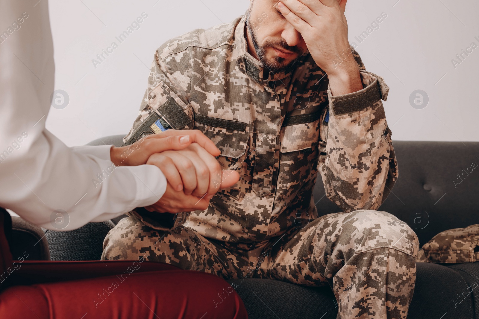 Photo of Psychologist supporting military officer in office, closeup