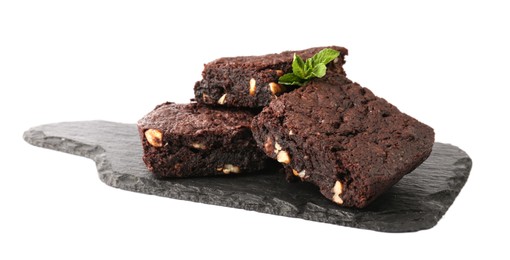 Delicious chocolate brownies with nuts and fresh mint on white background