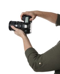 Photographer holding modern camera on white background, closeup