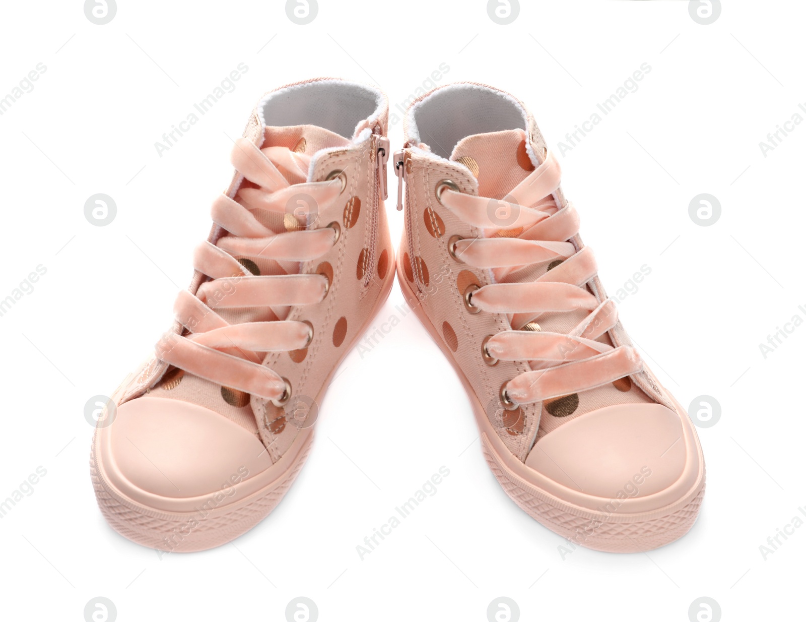 Photo of Pair of stylish child shoes on white background