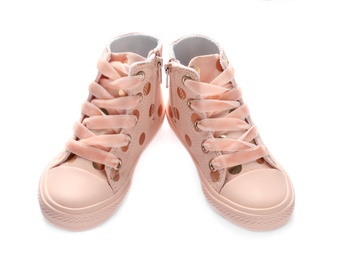 Photo of Pair of stylish child shoes on white background