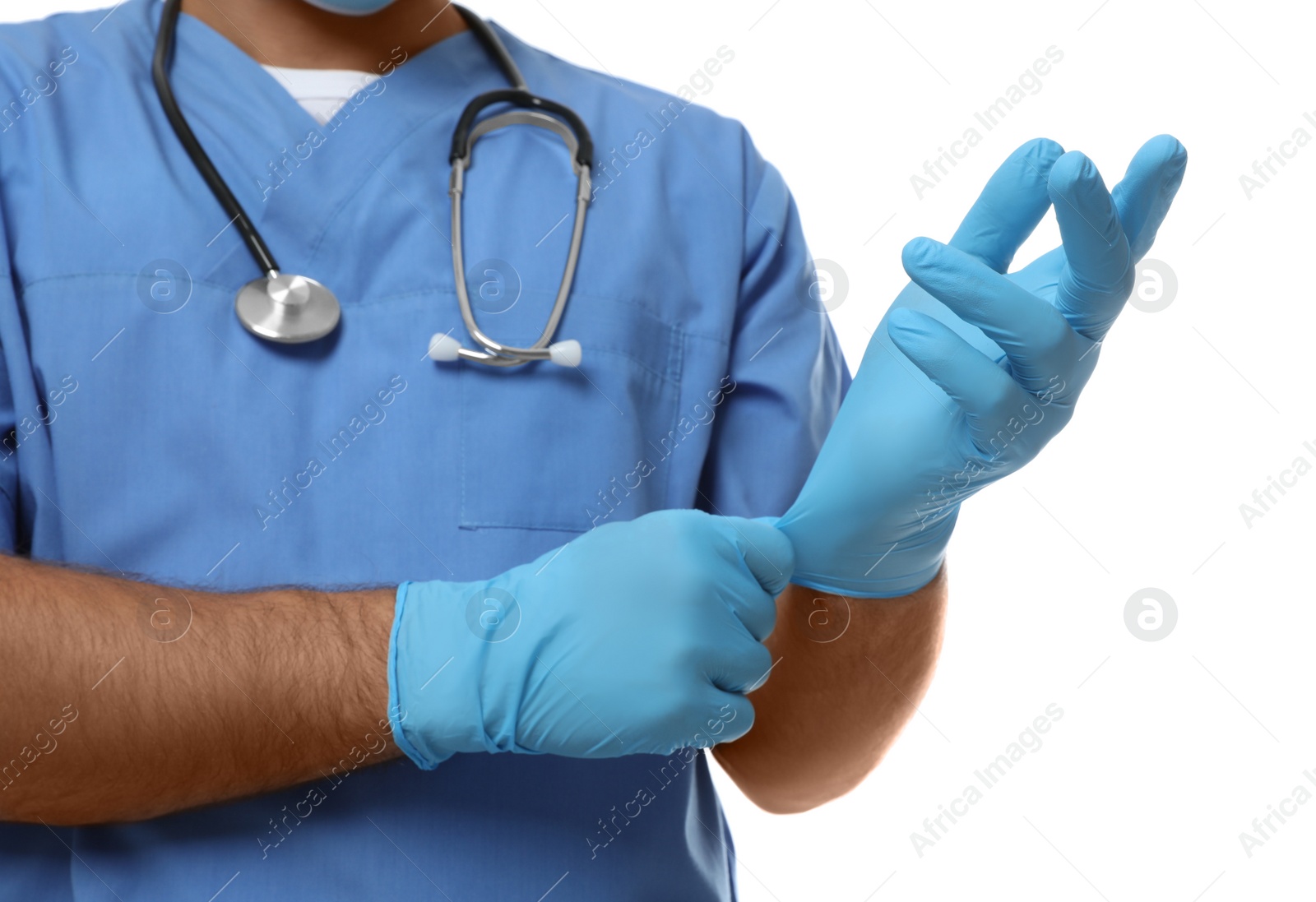 Photo of Doctor putting on medical gloves against white background, closeup