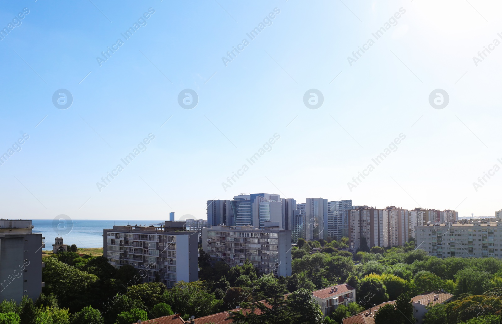 Photo of Picturesque view of city with beautiful buildings near sea
