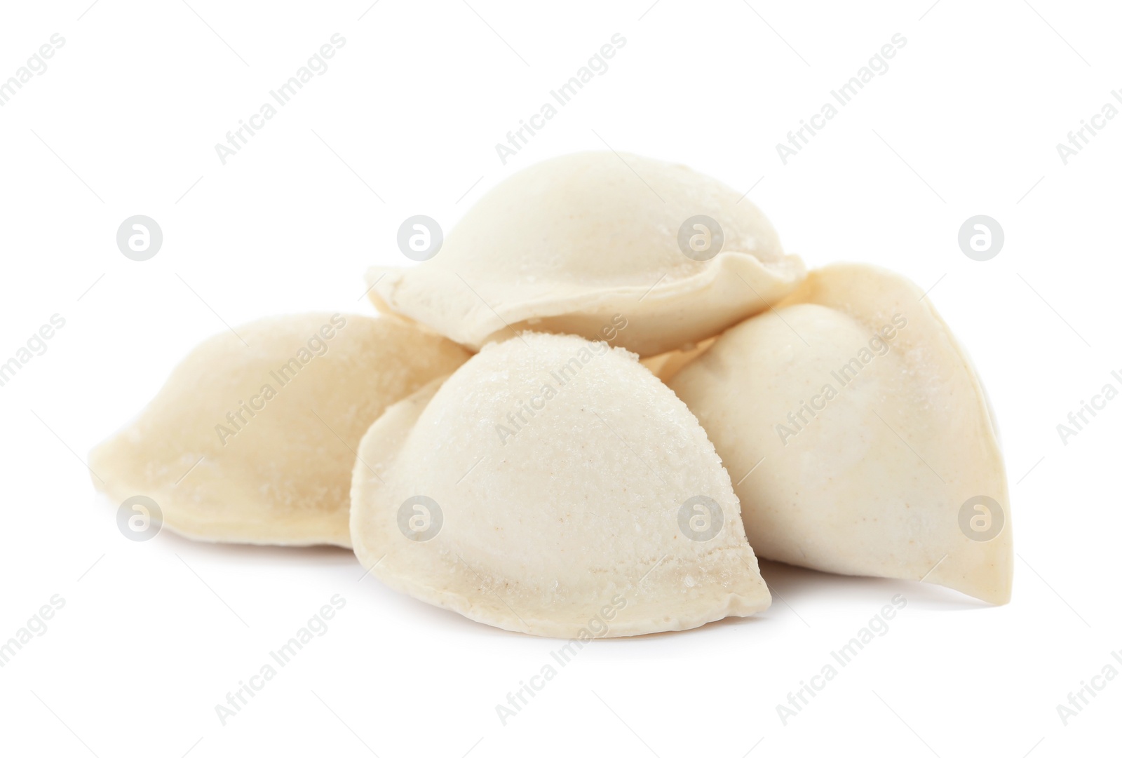 Photo of Heap of raw dumplings on white background