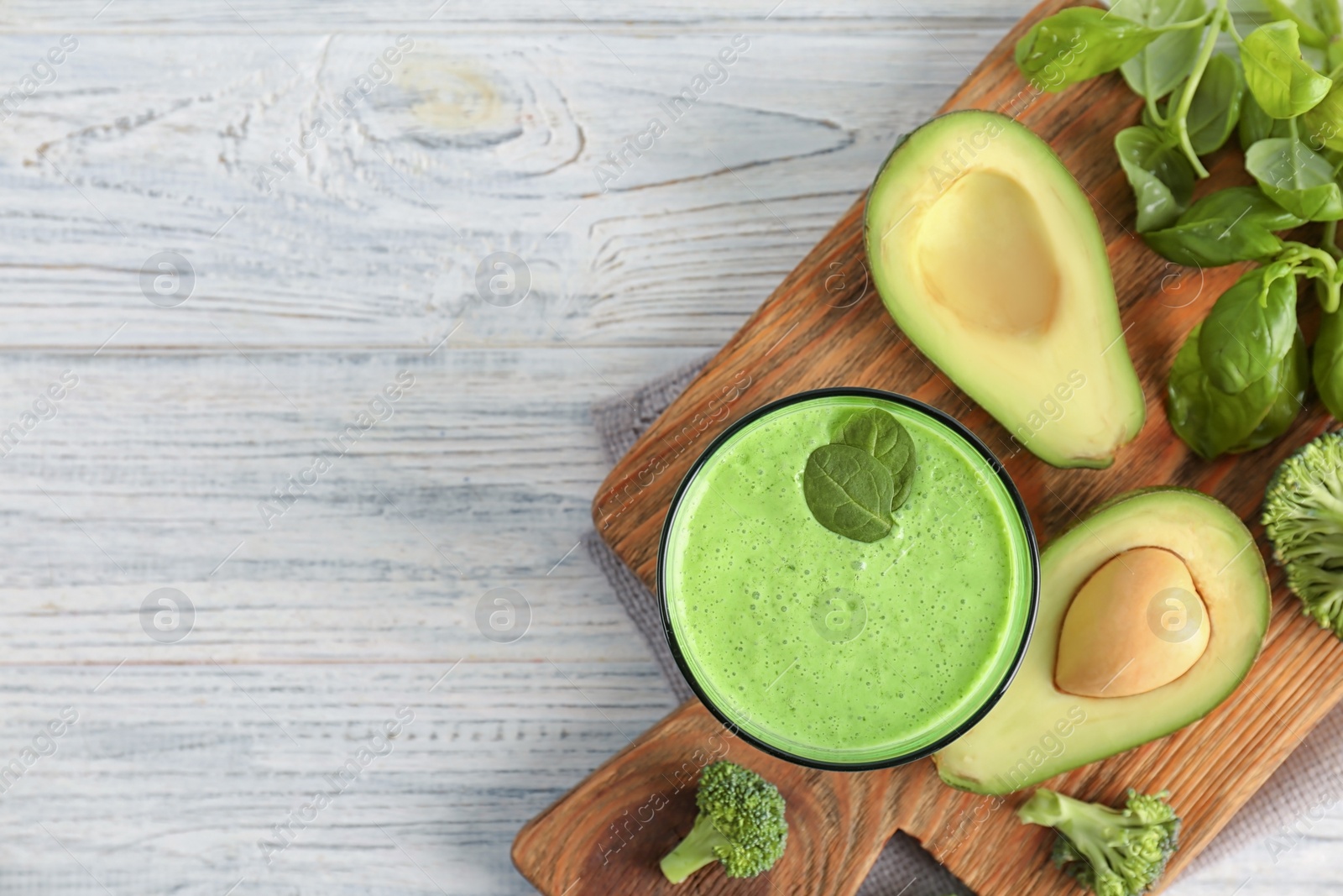 Photo of Flat lay composition with healthy detox smoothie and ingredients on light background