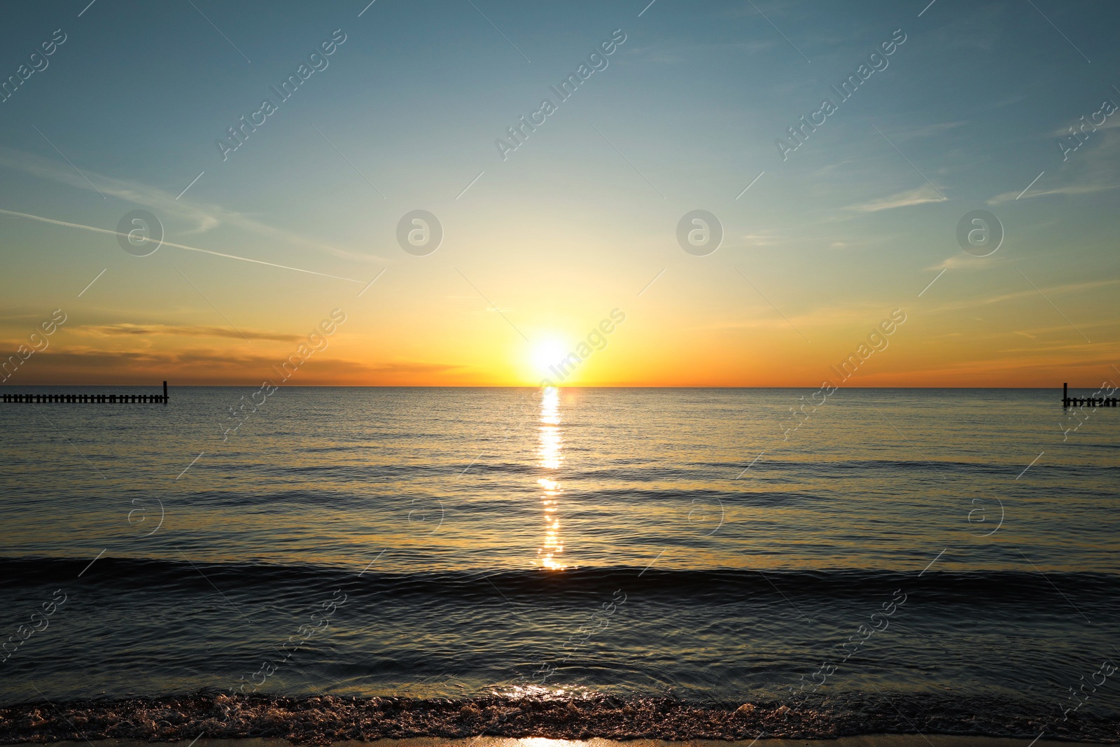 Picturesque view of beautiful sea at sunset Photo of Picturesque view of beautiful sea at sunset