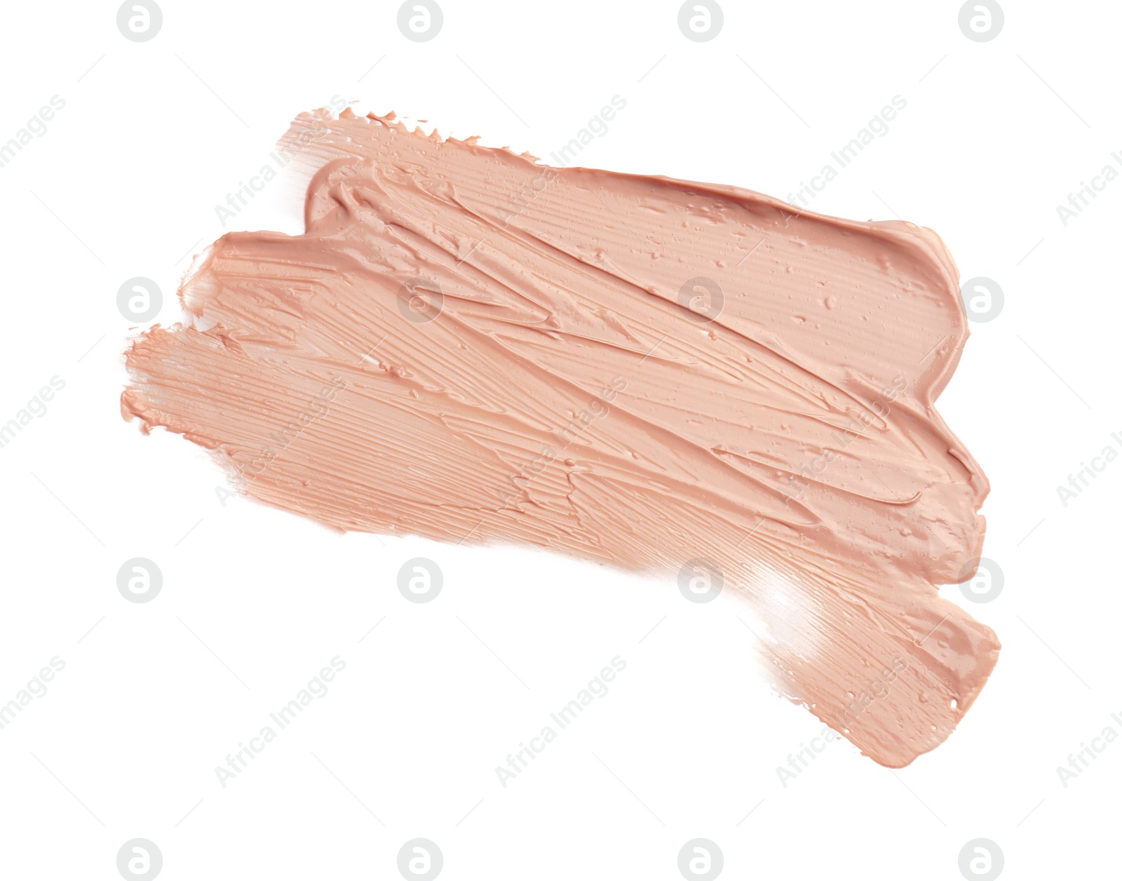 Photo of Strokes of pink color correcting concealer isolated on white, top view
