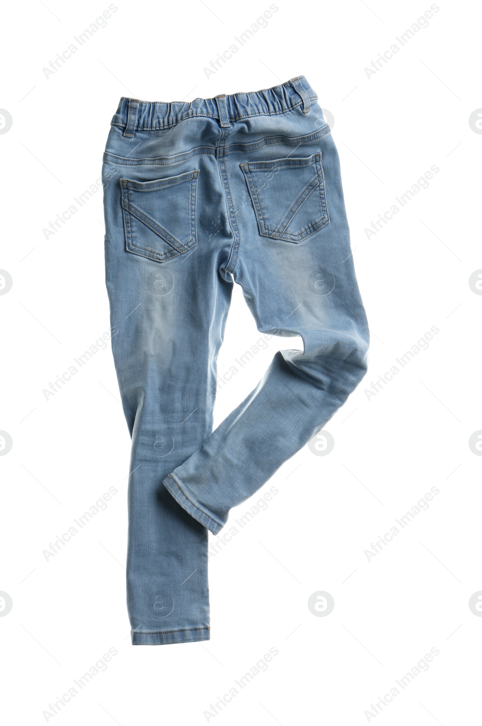 Photo of Rumpled jeans isolated on white. Messy clothes