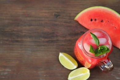 Photo of Delicious watermelon drink and fresh fruits on wooden table, flat lay. Space for text