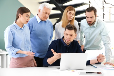 Office employees having argument during business meeting