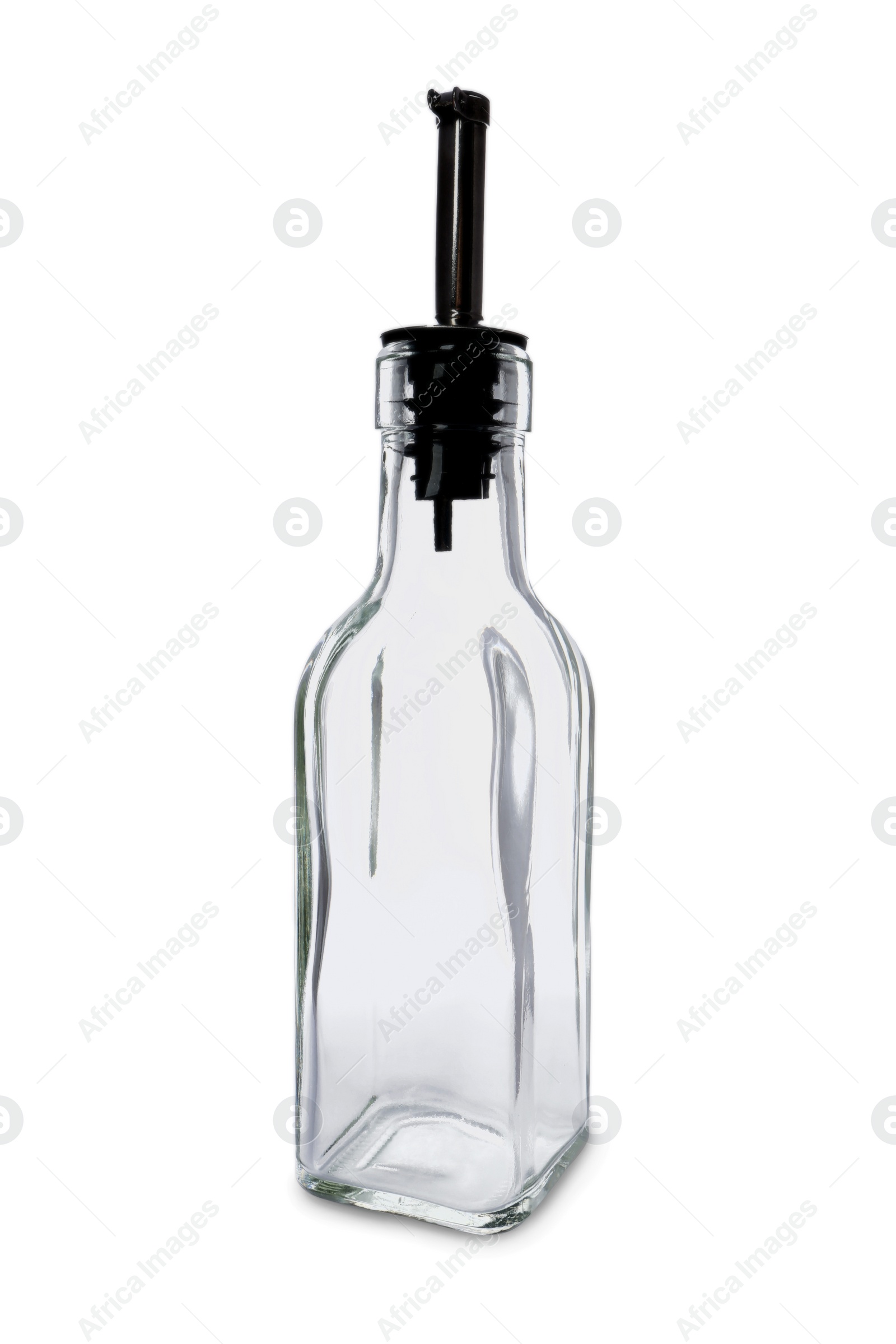 Photo of Empty glass bottle with pump for oil on white background