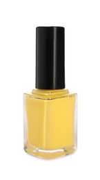 Photo of Yellow nail polish in bottle isolated on white
