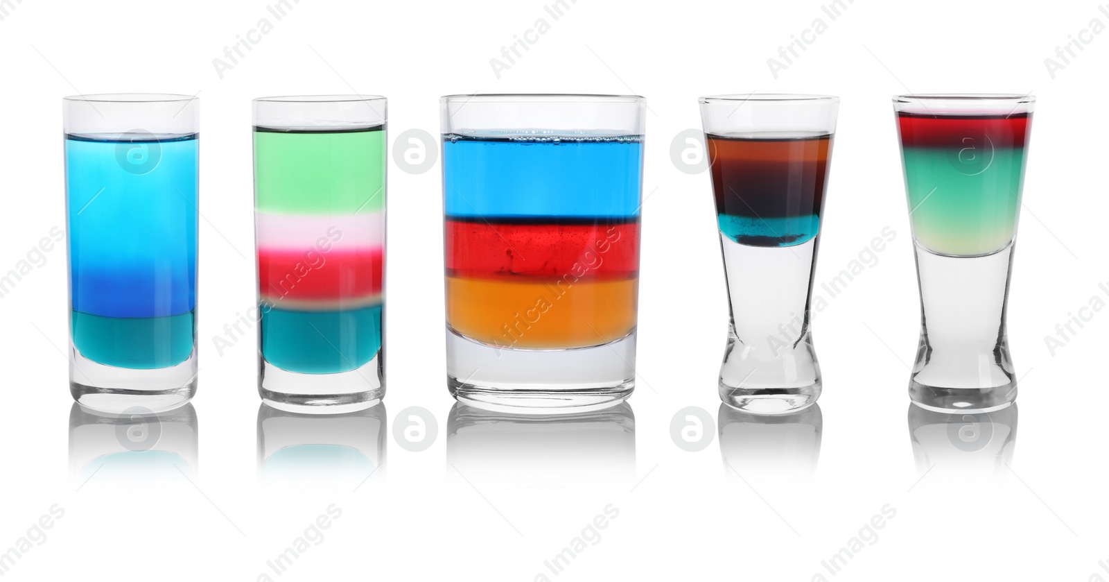 Image of Different shooters in shot glasses isolated on white, set