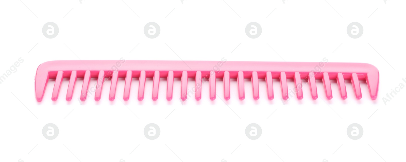 Photo of New pink hair comb isolated on white
