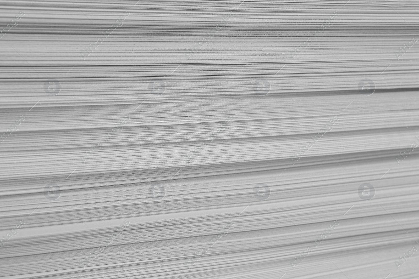 Photo of Stack of white paper sheets, closeup view